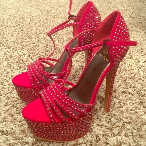 Red stiletto platform heels with rhinestones