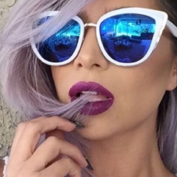 Two pairs of white sunnies