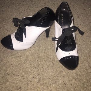 Retro black and white lace up heels