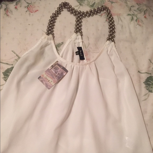 Beautiful white blouse with beads