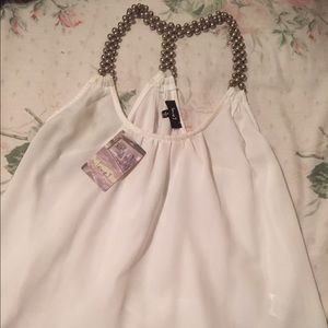 Beautiful white blouse with beads