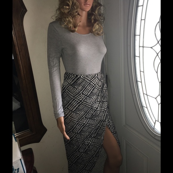 Long sleeve body suit with open back