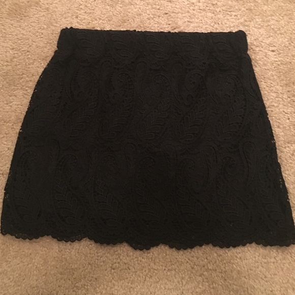 Black Skirt with lace-like overlay