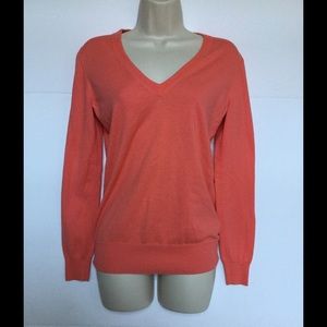 Peach colored J Crew sweater