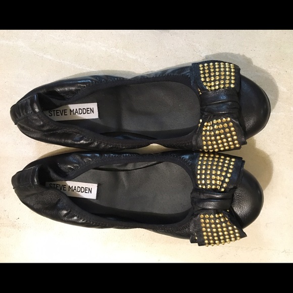 Black Steve Madden flats with gold bows