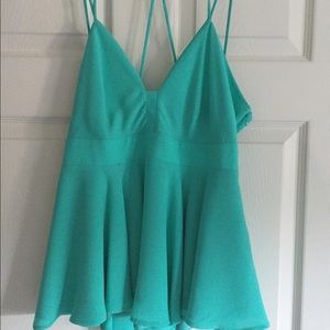 New turquoise strappy peplum tank