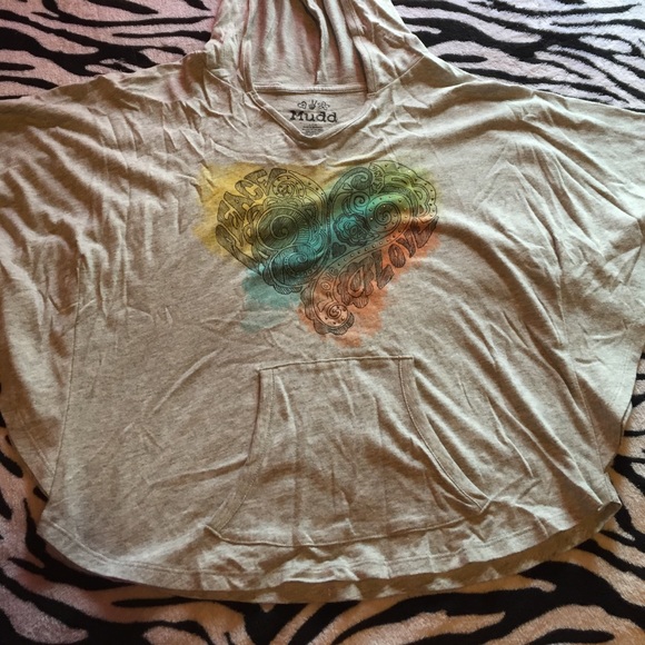 I'm selling a grey shirt with a heart on it