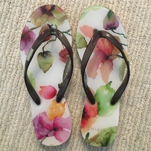 Aerin glossy flip flops