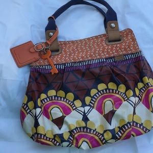 Purse. Fits on shoulder.