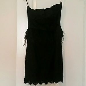 Strapless lace and feather bebe dress