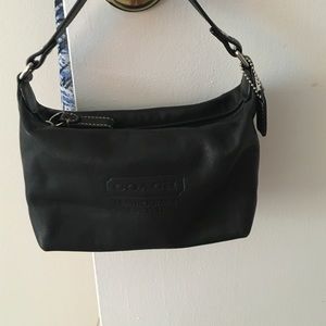 Small, black COACH purse