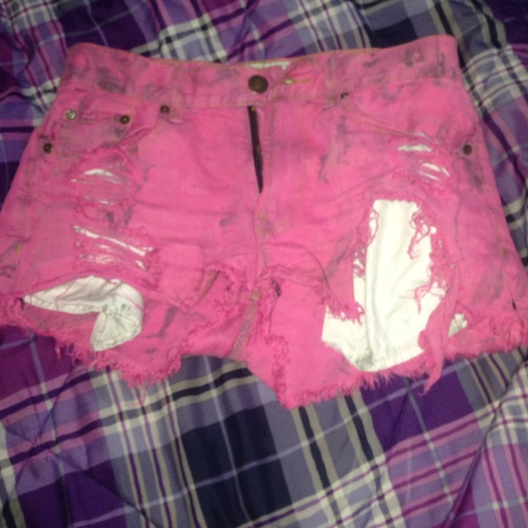 Pink high waisted distressed shorts