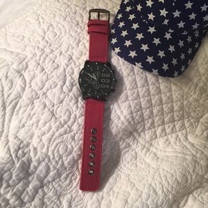 Oversized red watch with black dial. New