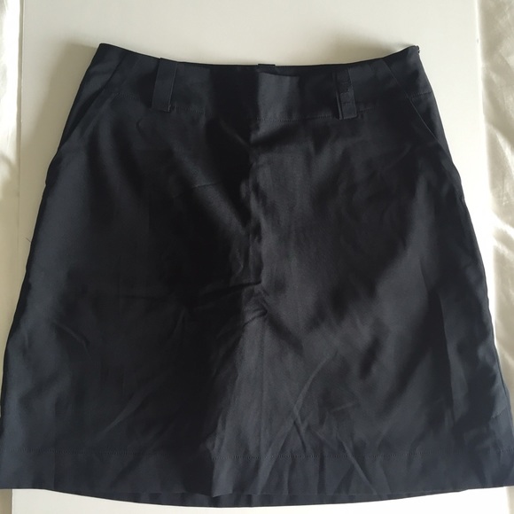 Nike Golf Dry-fit skirt lined short in black.