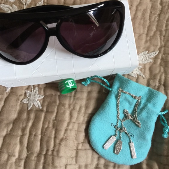 Hold Chanel RingTiffany Necklace and Dior Aviators