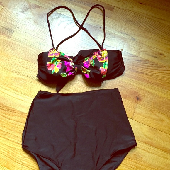 Two bathing suit tops and high waisted bottoms