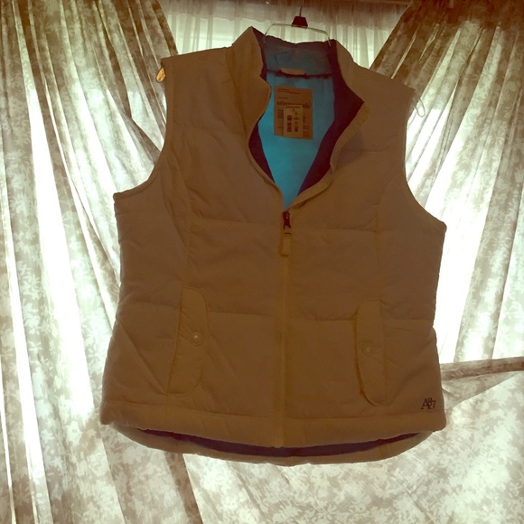 white with blue underlay vest