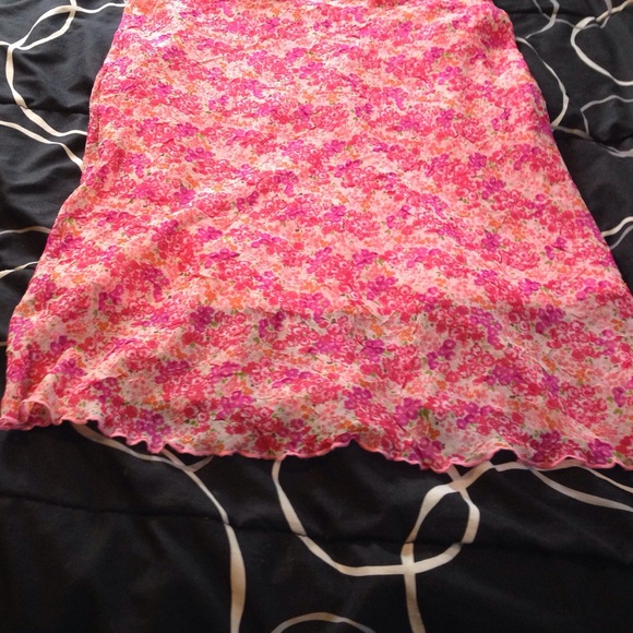 Pretty Pink shades in a floral skirt.