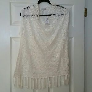 White sweater looking no sleeve top.