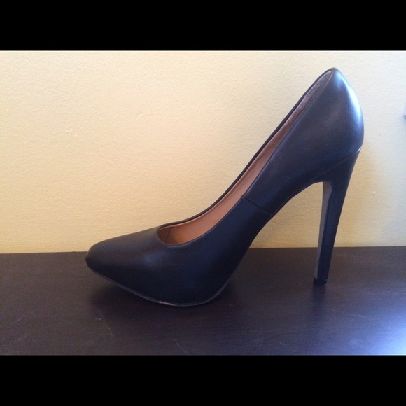 Pointed black heels