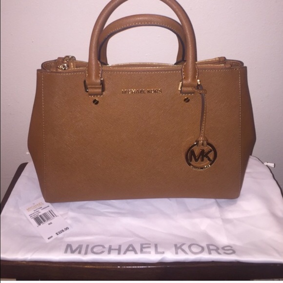Michael Kors Sutton in luggage