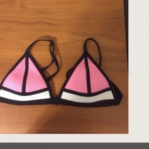 Triangl bikini set includes top and bottom