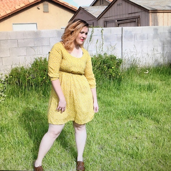 Yellow polka dot dress.