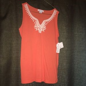 Peach colored tank top with detailing