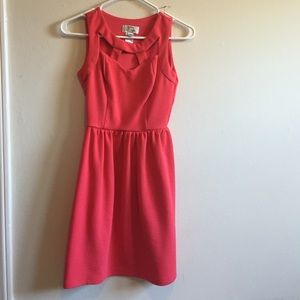 Coral / orange dress with cutouts in the front