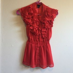 Ruffled orange blouse