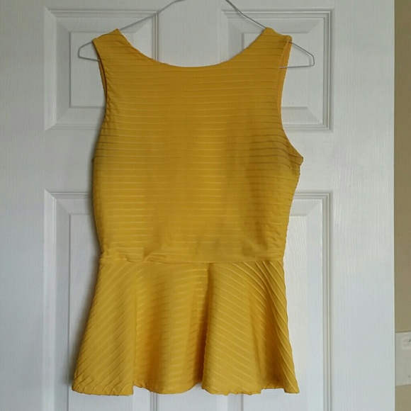 Sleeveless yellow shirt