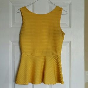 Sleeveless yellow shirt