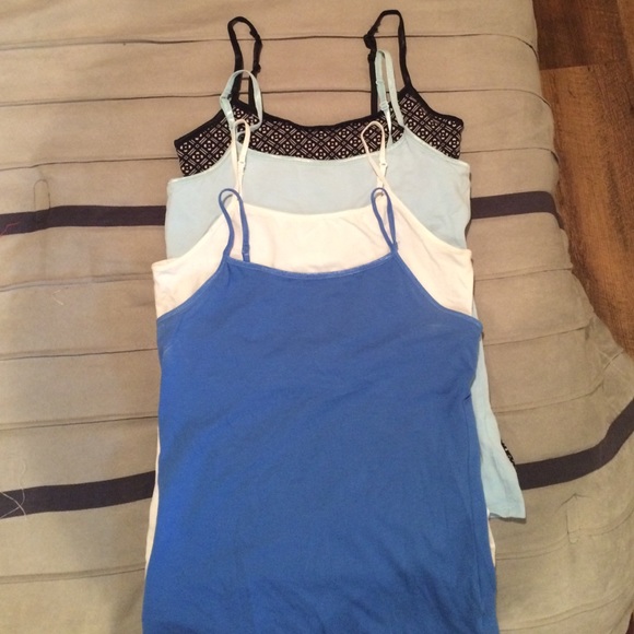 4 colored tank tops worn twice