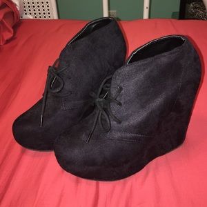 suede booties with a wedge heel