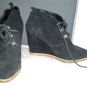 Black suede booties by Steve Madden.