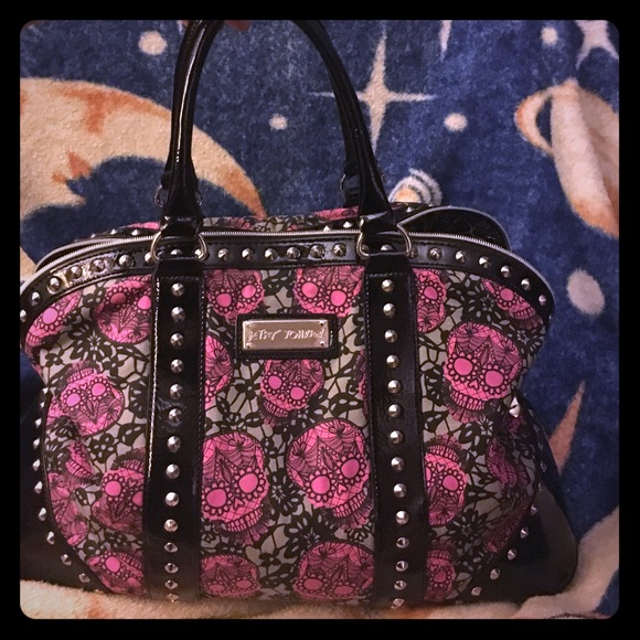 Betsey Johnson skull large travel bag.