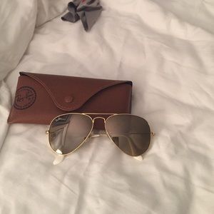 Ray-Bans aviator style.