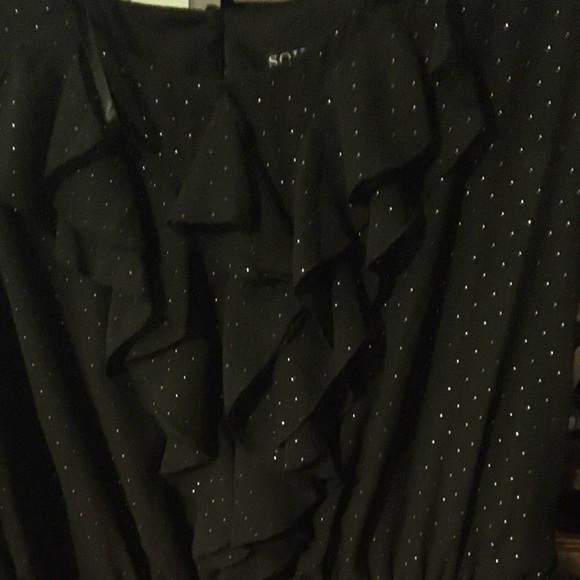 Black and gold polka dot dress.
