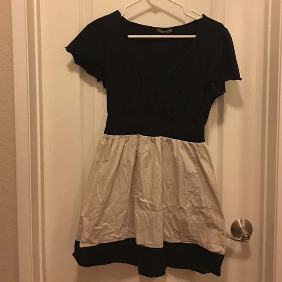 Cute black and beige dress with capped sleeves
