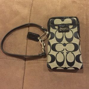 Authentic black and grey coach phone wristlet