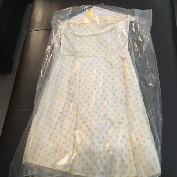 Yellow and white polka dot strapless dress