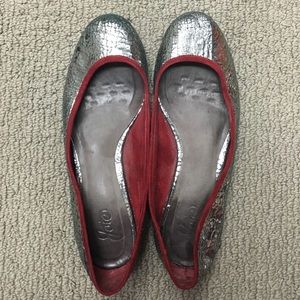 Joie silver metallic flats with red suede trim.