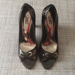 Carlos Santana black heels