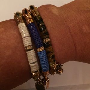 Set of Henri Bendel stretch bracelets.