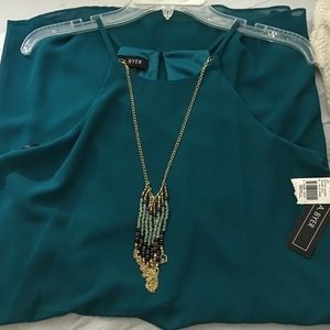A. Byer dress with attached necklace, size Small