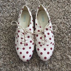 White and red polka dot sneakers