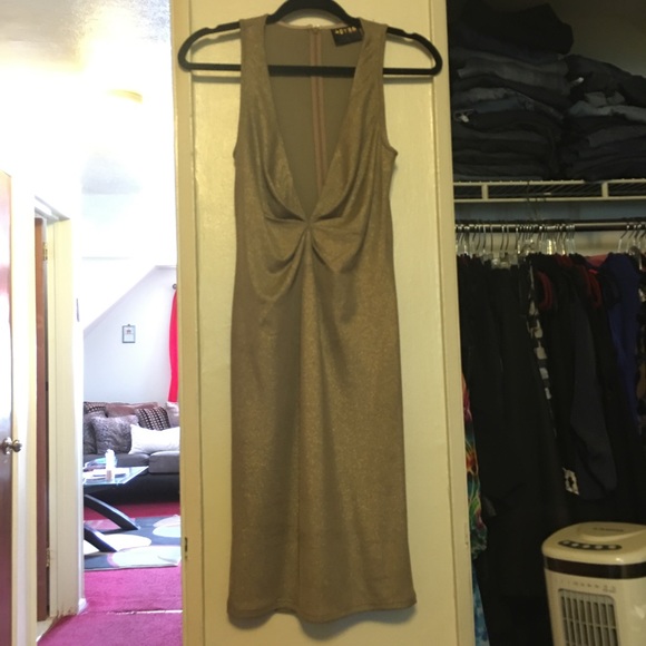 Gold abyss dress,never been worn.