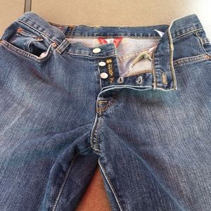 Lucky button front mid rise boot cut jeans