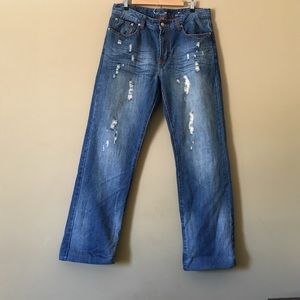 Distressed red camel jeans