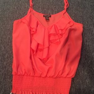flowing tank top with ruffles on the chest